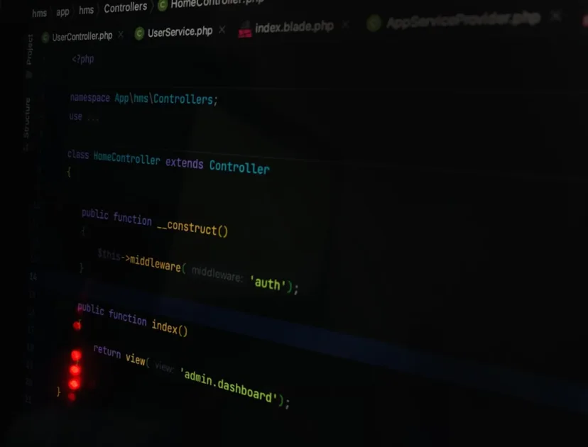 a computer screen with a red light on it